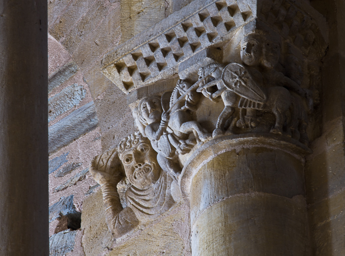 Capital detail - combat between two knights, Basilique Sainte Foy, Conques (Aveyron) Photo by Dennis Aubrey