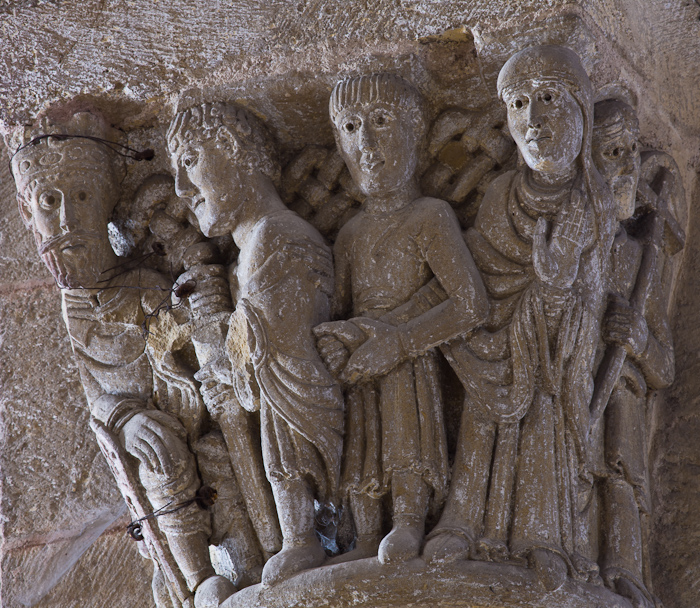 Capital detail - the arrest of Sainte Foy, Basilique Sainte Foy, Conques (Aveyron) Photo by Dennis Aubrey